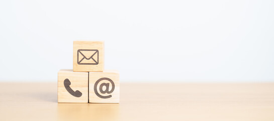 Contact Us concepts. Wood block of Email, call Phone and Website Address sign. For Customer support...