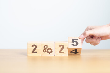 2024 year change to 2025 year block with gear icon. Business Process, Team, teamwork, Goal, Target,...