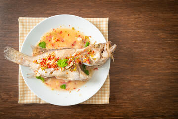 Steamed grouper fish with lime and chillies