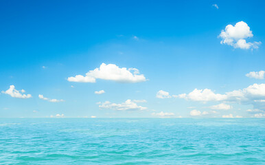 Naklejka premium Summer background sea blue with cloud sky, coast island scene mockup water nature travel vacation holidays tropical, mockup ocean ecosystem energy change environment, backdrop product cosmetic.
