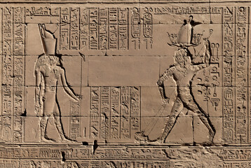 wall Reliefs at the Temple of Edfu at Aswan Egypt.