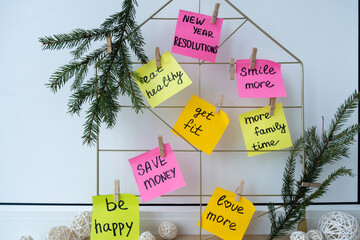 Vision board with new year resolutions aims goals on sticky notes. Preparation for New Year....