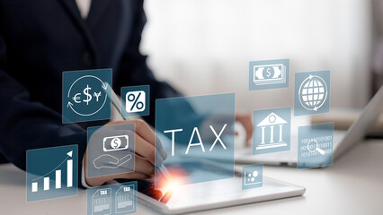 The Businessman calculates taxes using a calculator and laptop. Income tax, Icons related to...
