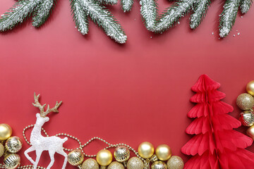 Christmas presents. Christmas decorations, frosted pine branches on red background. Top view, Christmas composition,empty space. Celebration card