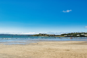 Serene Beach Scene with Clear Blue Sky in Cornwall, UK