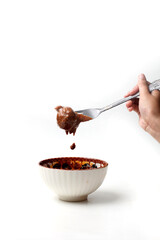 Close up of Siomay Bandung or steamed dumplings,Close up of Siomay Bandung or steamed dumplings, dipped in peanut sauce