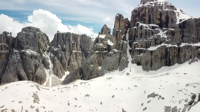 Snow Covered Moon-like Landscape Near The Pisciadu Hutte In Daytime In Bolzano, South Tyrol, Italy. - aerial pullback shot