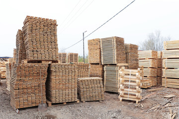 Wooden pallets for transportation of building materials.Wooden pallets are stacked.