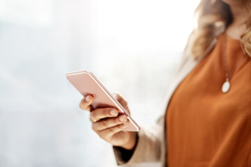 Hands, business and woman with smartphone, internet and texting with connection, social media and typing. Closeup, communication and consultant with cellphone, contact and message with digital app