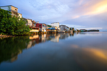 Fototapeta premium People's houses along the Bang Nara River Narathiwat Province, Thailand.