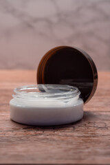 Natural Cosmetics: White Cream in Elegant Packaging.