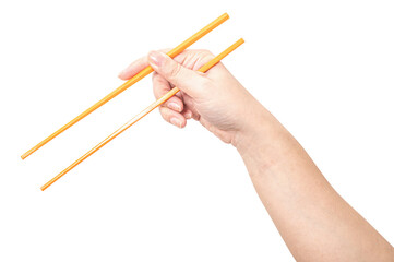 Female hand holding a orange plastic chopstick isolated on white background.