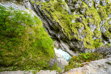 Nature in the Tiefenbachklamm between Kramsach and Brandenberg. Landscape with a river and rocks in the Alpbachtal.
