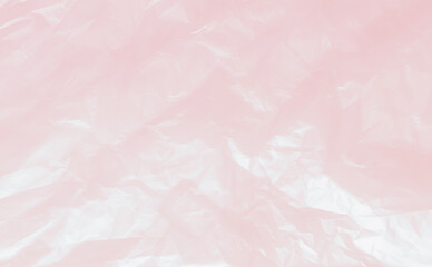 Autumn background pink color plastic wrinkle bag film glossy crumpled overlay package rough wrap material pack reflection texture floor packaging retail grain pollution trash polyethylene.