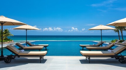 Fototapeta premium 150. Poolside scene with plush sunbeds under elegant umbrellas, facing a beautiful swimming pool and the endless ocean, perfect for a holiday retreat
