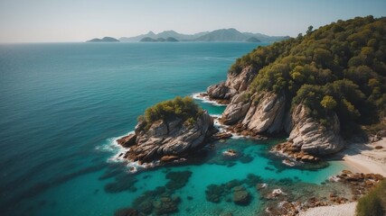 Aerial View of Rocky Island with Turquoise Ocean Water.