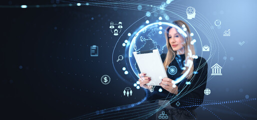 Woman using tablet with digital global network and icons on dark