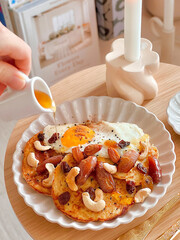 Healthy banana oatmeal pancakes with sunny side up egg recipe. Simple brunch menu. Morning time. Fresh meal. Delicious food. Scandinavian style. Homemade food. Cooking recipes. Dessert. Fruits. Seeds.