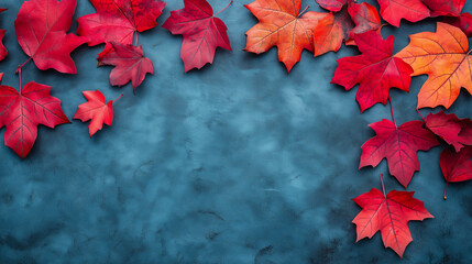 Autumn banner. Red leaves on dark blue slate with copy space. Autumn background