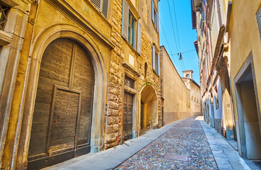 Fototapeta premium Historic townhouses and churches, Via Arena, Bergamo, Italy