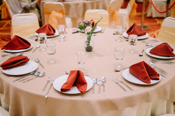 Luxurious hotel dining table set with elegant tableware