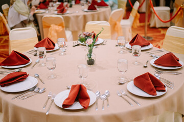 Luxurious hotel dining table set with elegant tableware