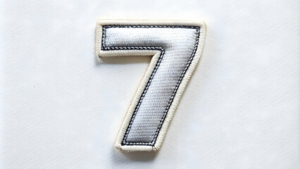 Number 7 embroidered patch on a white background, number, seven, 7, patch, embroidered, white, background, sewn