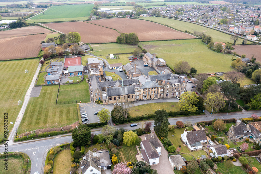 Wall mural aerial drone photo of a typical housing estate in the village of boston spa in leeds west yorkshire 