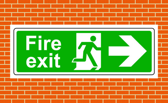 Fire exit right sign on a wall