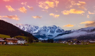 Naklejka premium Panoramic view of scenic Gosau village in the middle of Alps mountains in Austria.