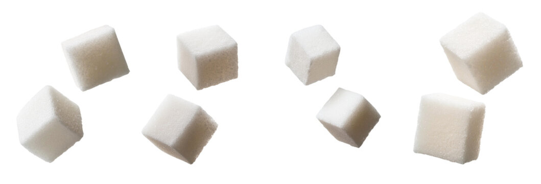 A collection of sugar cubes on a white background, ideal for culinary and beverage related themes and recipes.