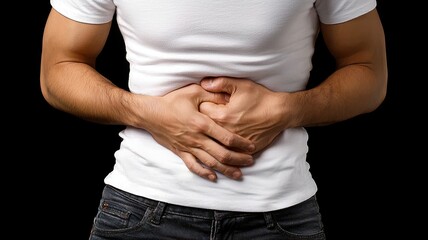 A close-up of a man clutching his stomach, depicting discomfort or pain, symbolizing health issues and human experiences.