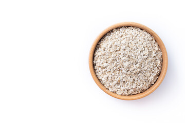 Rolled oats, healthy breakfast cereal oat flakes in bowl isolated on white background. Top view. Copy space