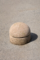 Obraz premium Concrete semicircular barrier preventing parking