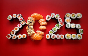 Sushi and sushi various  isolated. featuring Sushi and sushi various arranged to form the numbers 2025 on a red background. Japanese sushi 2025 isolated
