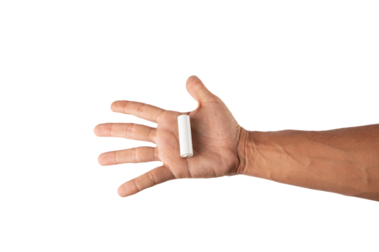 Male hand holding a white mockup cell battery AA isolated no background
