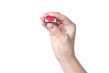 A woman's hand holds a mochi candy, shows the size and berry red filling on white  or transparent png background isolated