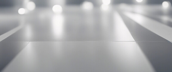 Obraz premium Spotlit grey floor in white and gray studio backdrop
