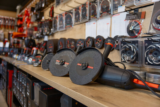 Hardware store with angle grinders power tool assortment on shelves