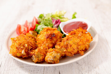 Crispy Fried Chicken Drumsticks with Salad and Ketchup – Delicious Meal