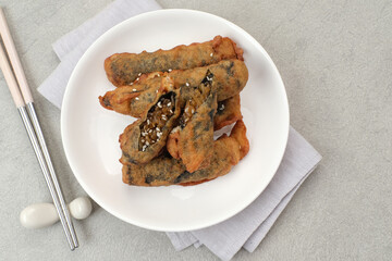 Gimmari or Kimmari, made from seaweed rolls filled with vermicelli or japchae. Korean food
