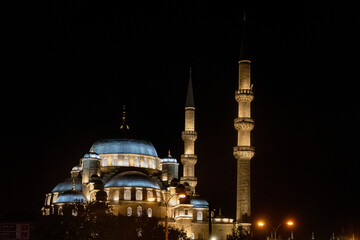 Night photo taken abroad of the new mosque in Istanbul's Eminönü Square