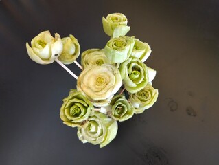 The creation of roses from the base of the bok choy vegetable stem, arranged into a beautiful...