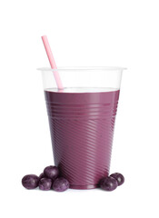 Tasty acai juice and berries isolated on white