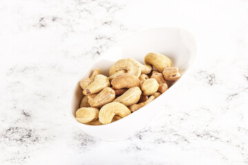 Cashew nuts heap in the bowl
