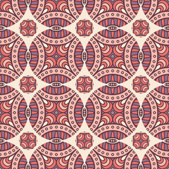 A vibrant geometric pattern featuring circular shapes and intricate designs in warm colors.
