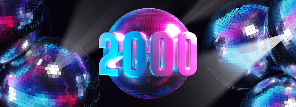 date 2000 &eacute;crite sur une boule &agrave; facette &eacute;clair&eacute;e par des projecteurs bleu et rose