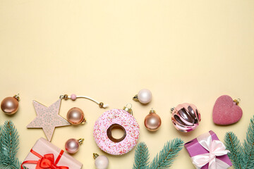 Flat lay composition with Christmas decor and gift boxes on beige background. Space for text