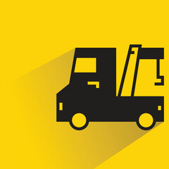 tow truck icon with shadow on yellow background