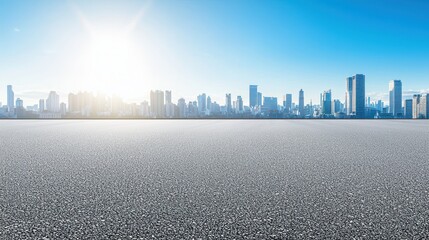 Empty Asphalt Road with Modern City Skyline and Bright Sunny Sky
